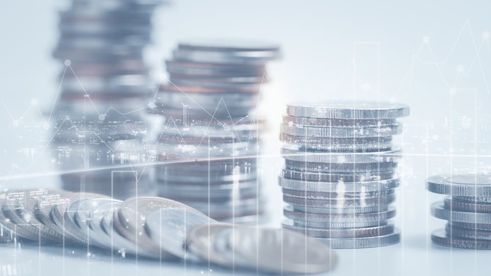 double exposure of graph and rows of coins